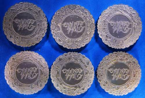 Six top quality deep-carved rounds