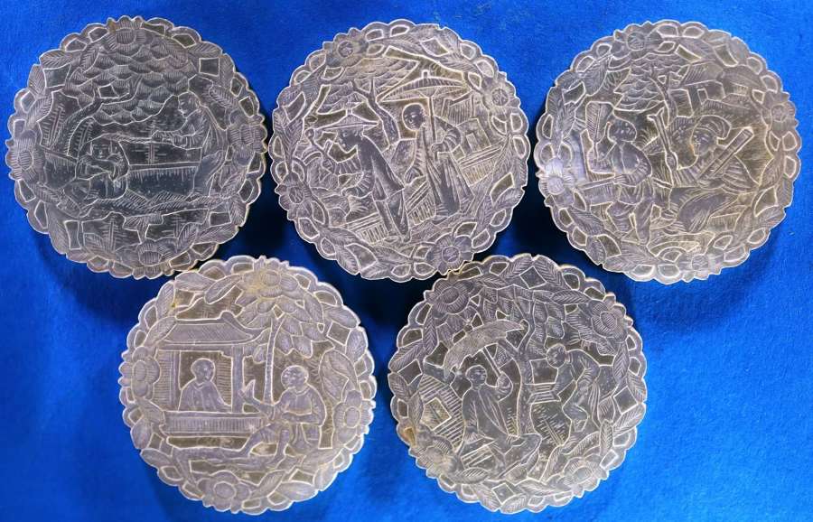 Five top quality deep-carved counters