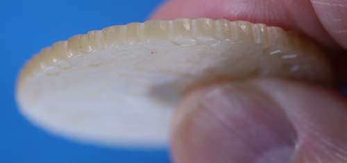 One extra-large deep-carved counter