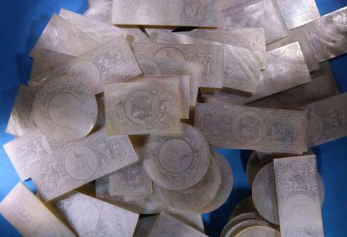 Group of 64 large armorial counters for unidentified family