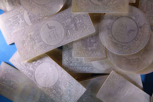 Group of 64 large armorial counters for unidentified family