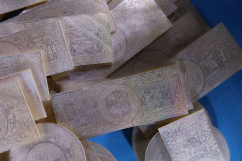 Group of 64 large armorial counters for unidentified family