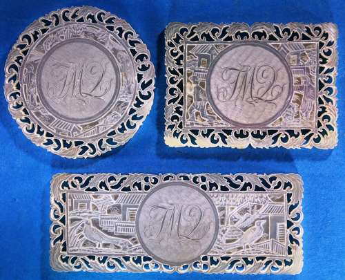 Superb set of three large deep-carved fretted armorials