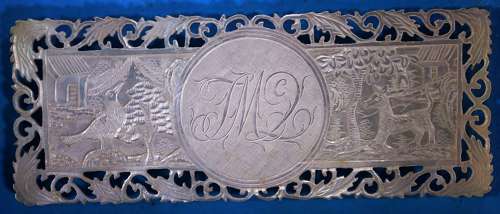 Deep-carved fretted armorial!