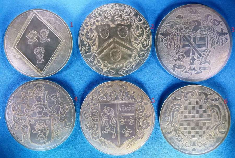 Six different early round armorials