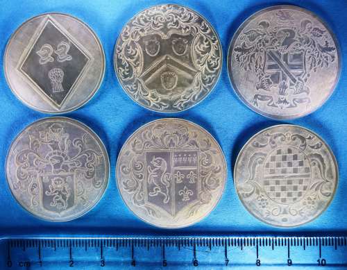Six different early round armorials