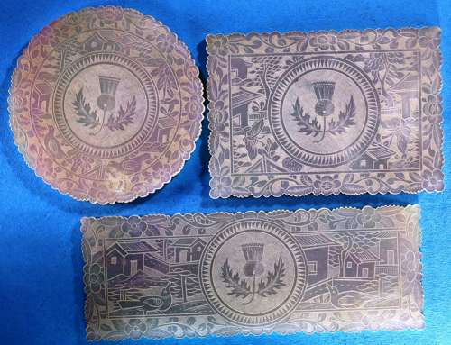 Set of three shapes with thistle ?crest?
