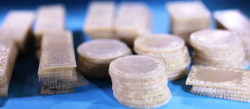 Group of 120 small fretted counters