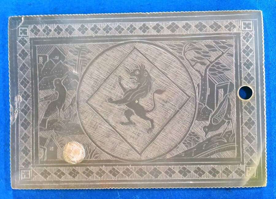 Rare counter - crest in a lozenge