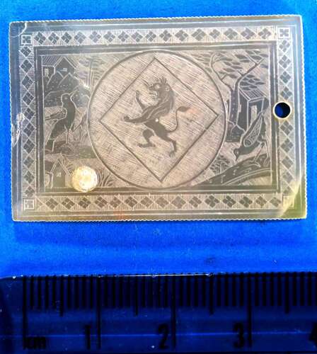 Rare counter - crest in a lozenge