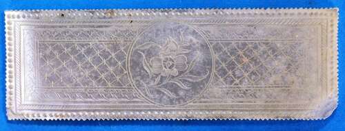 Counter with 'Q' monogram.